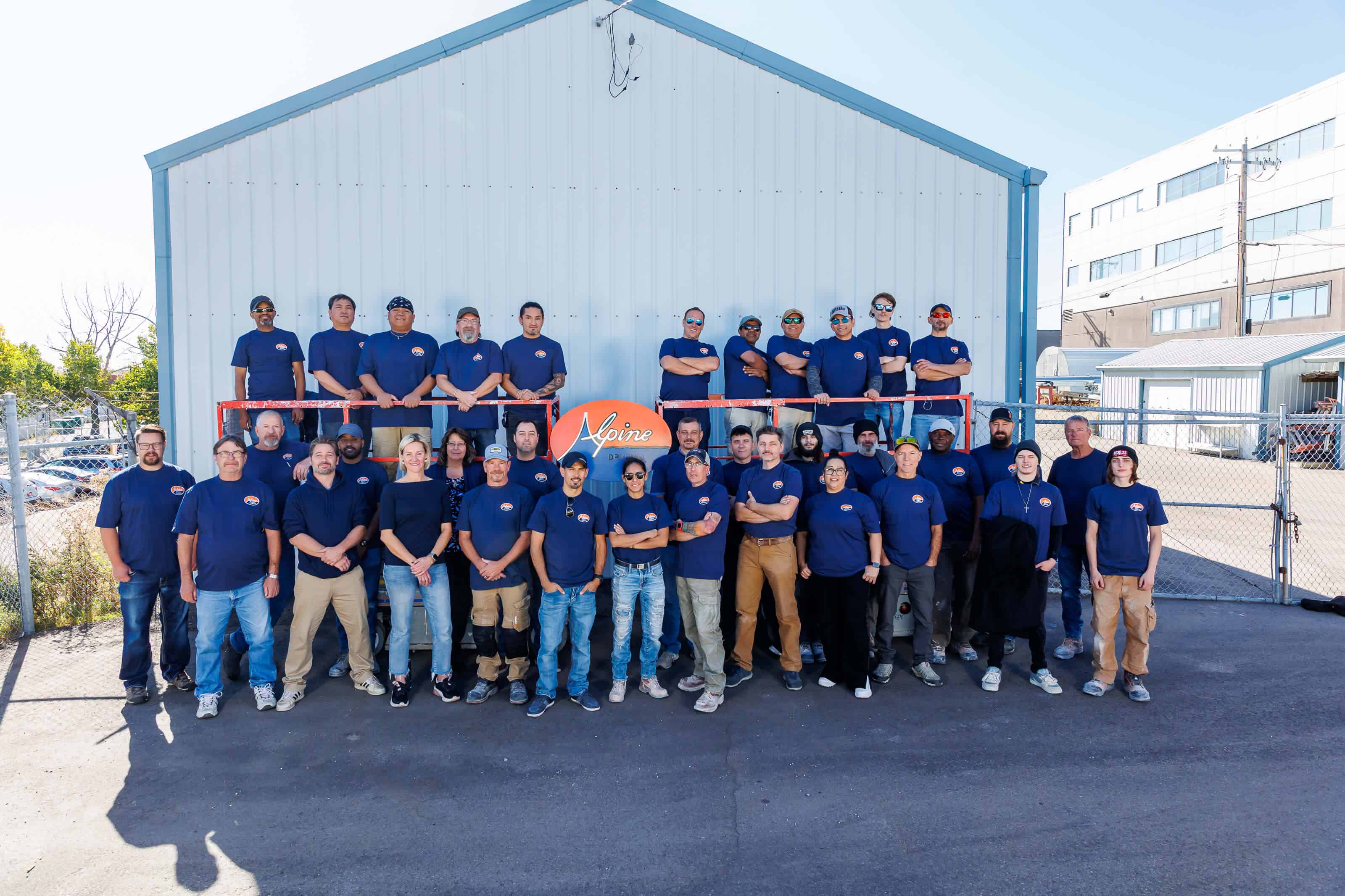 Alpine Drywall leadership team at a Calgary commercial project